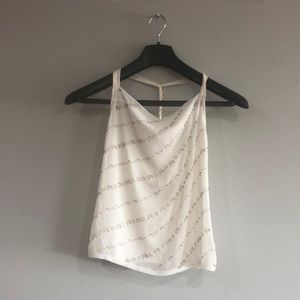 White sleeveless top